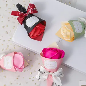 Detail of mini soap rose bouquets in various colors featuring elegant gift wrapping