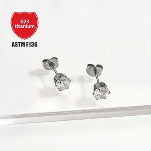 Detail view of G23 titanium stud earrings with round sparkling cubic zirconia stone