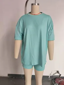 Minimalist women's casual loose solid color pajama set with T-shirt and matching shorts