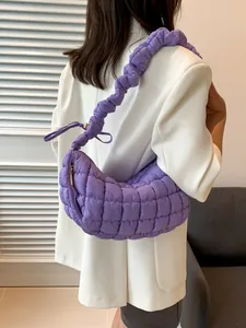 Elegant purple quilted puffy dumpling shoulder bag with unique ruched strap design