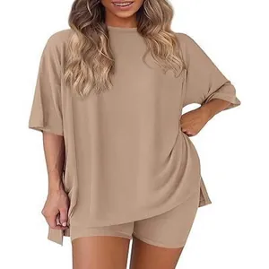 Women's stylish two-piece solid tan lounge set with oversized T-shirt and ribbed shorts
