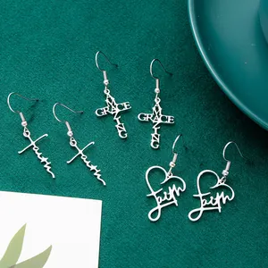 Set of stainless steel Faith heart and Amazing Grace cross dangle earrings for women.