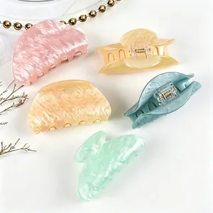 Set of 5 medium acrylic hair claw clips with marble water ripple pattern texture