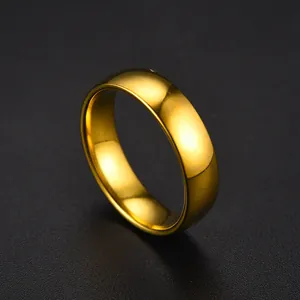 Detailed close-up of a classic gold-plated stainless steel polished plain ring band