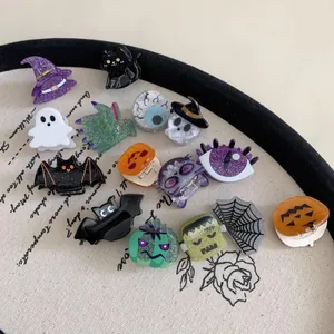 Assorted collection of Halloween mini acrylic hair claws with ghost and pumpkin designs