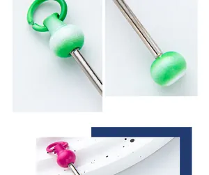 Macro detail of gradient green and pink DIY beading rods for handmade keychain crafts