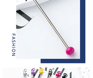 Close-up of colorful DIY beadable metal sticks for personalized keychains