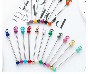 Close-up of colorful DIY metal beading rods for handmade keychain pendants