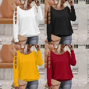 Multi-color long sleeve top featuring ladder shoulder cut-outs and a slim fit design