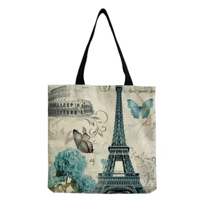 Stylish vintage linen tote bag featuring Eiffel Tower and butterfly print detail