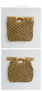 Detailed view of large capacity straw woven beach bag featuring a sleek wooden handle
