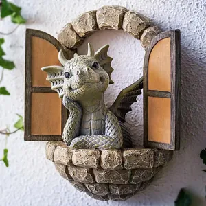 Realistic resin garden dragon statue peeking through a stone window wall decoration