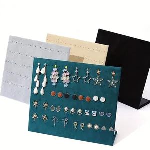 Professional teal velvet earring display stand with multiple holes for stud jewelry