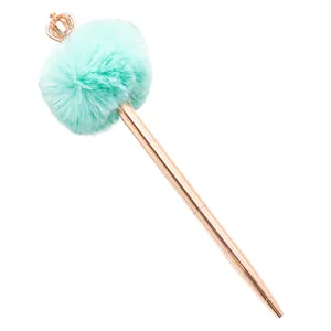 Elegant rose gold ballpoint pen featuring a soft mint green fur ball and crown top