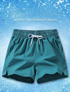 Detail view of men's quick-dry athletic shorts in teal with adjustable drawstring