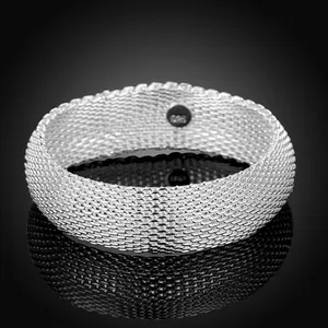Close-up detail of a silver-plated woven mesh bracelet with S925 hallmark stamp