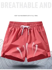 Breathable quick-dry athletic men's shorts featuring a drawstring waist and pink ice silk fabric