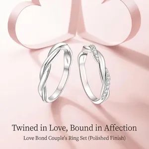 Coppia di anelli per coppia in argento sterling intrecciati con finitura lucida