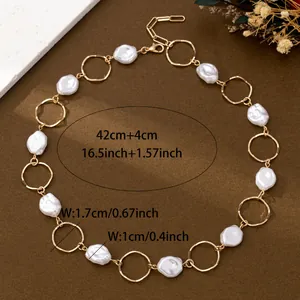 Detailed view of baroque pearl necklace with gold rings and precise dimensions