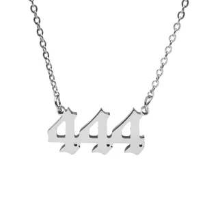 Close-up of stainless steel angel number 444 pendant necklace in gothic font