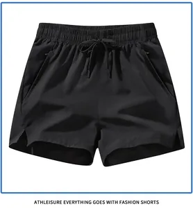 Close-up detail of men's quick-dry black athletic shorts with drawstring elastic waist