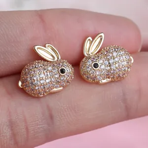 Boucles d'oreilles lapin étincelantes en cristaux dorés pour jeunes filles et enfants.