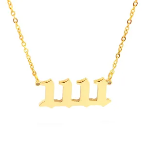 Close-up detail of golden 1111 angel number pendant necklace with gothic font design