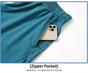 Detailed macro view of quick-dry sports shorts showing secure side zipper pocket