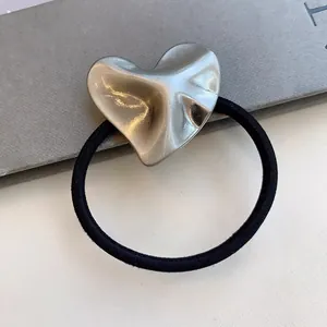 High-quality minimalist metallic silver heart charm hair tie with black elastic band