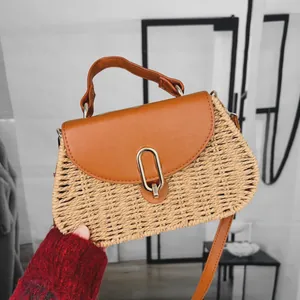 Vintage paper straw woven shoulder bag with brown leather flap for beach vacation