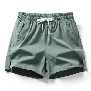 Men's sage green quick-dry ice silk athletic shorts with adjustable white drawstring