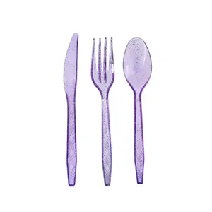 Detail of translucent purple glitter disposable plastic cutlery set for party events