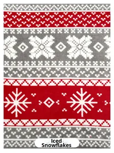 Gros plan détaillé du tissu en flanelle à motif de flocons de neige de Noël rouge et gris