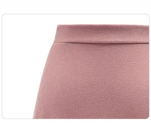 Close-up of high elastic waist on mauve knit midi skirt showing fine fabric texture