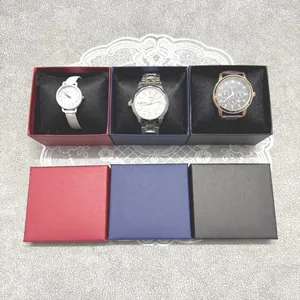 Set of three premium ribbed watch gift boxes in red, blue, and black with velvet cushions.
