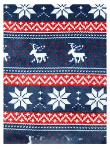 Gros plan sur un tissu de flanelle de Noël avec des motifs de rennes et de flocons