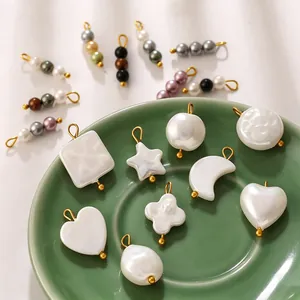 Mixed faux pearl charms in heart star moon shapes for DIY jewelry crafts and decor