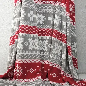 Soft flannel fleece fabric with red and grey Christmas snowflake and heart pattern print