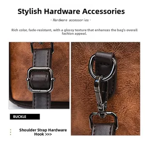 Detailed view of glossy dark metal hardware and buckle on a vintage brown leather bag