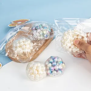 Stress relief sensory pearl squishy toy with colorful decorative pearls in clear pouch