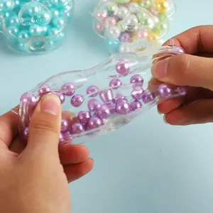 Cute translucent cat paw squishy stress relief squeeze toy filled with purple pearls