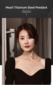 Elegant titanium steel heart pendant necklace showcased on a professional model