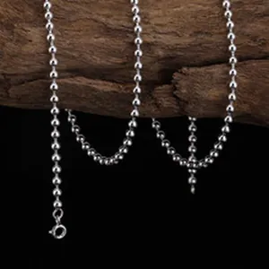 Detailed close-up of a S925 sterling silver beaded chain with retro style texture