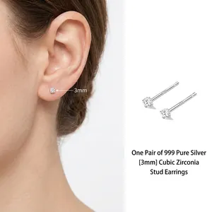 Close-up detail of 3mm 999 sterling silver stud earrings featuring sparkling cubic zirconia