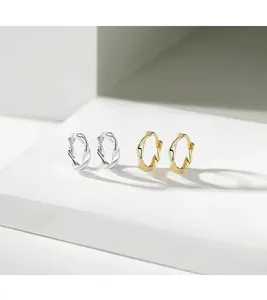 Elegant 925 sterling silver Mobius hoop earrings in gold and silver twisted design