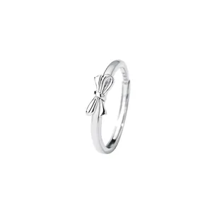 Elegant S925 sterling silver bow knot ring featuring a minimalist polished plain band