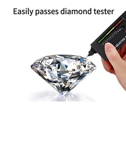 Close-up of a Moissanite gemstone being tested with a professional diamond selector pen.