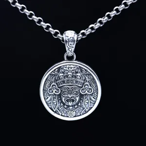 Macro detail of S925 sterling silver Zagi Lhamo deity pendant with retro finish