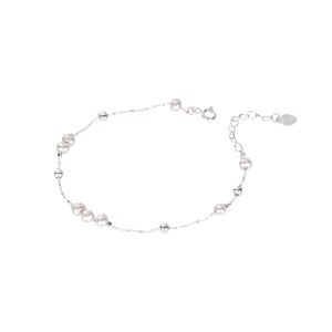 Elegant S925 sterling silver bracelet with freshwater pearls in a dainty starry design.