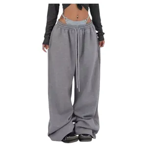 Women's baggy grey street dance sweatpants featuring adjustable drawstring waist.